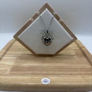 Collier en Améthyste brute orné d'une cage coeur & ailes d'ange